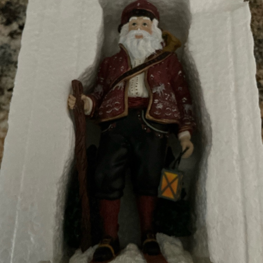 Festive Santa Claus Figurine in Red and White